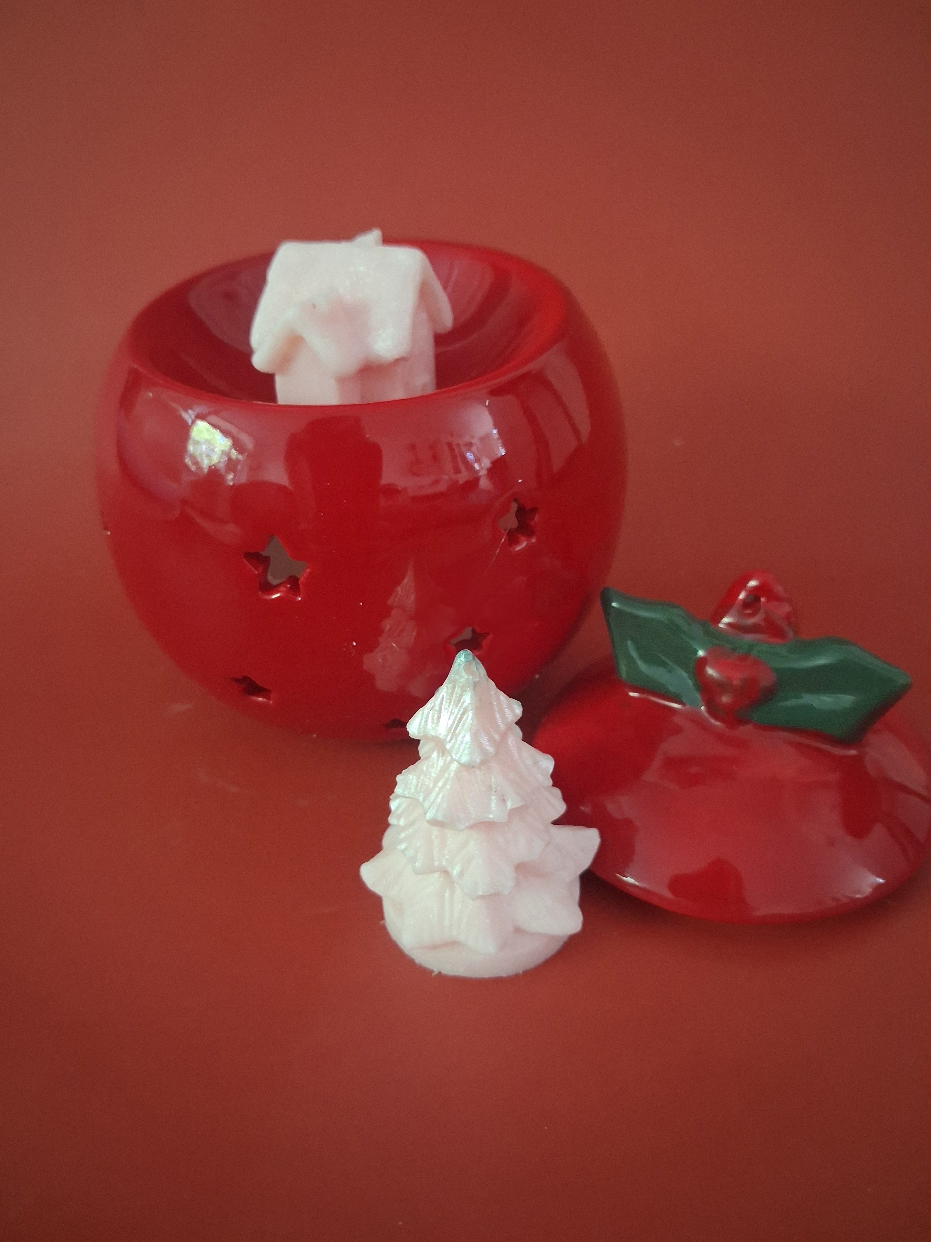Rode kerstbal waxmeltbrander