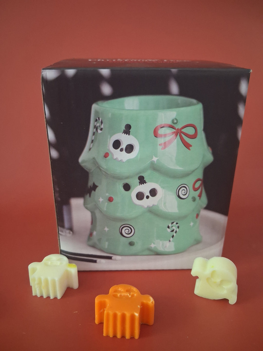 Griezelige kerstboom waxmeltbrander