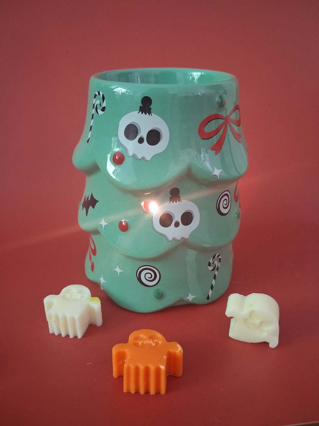 Griezelige kerstboom waxmeltbrander