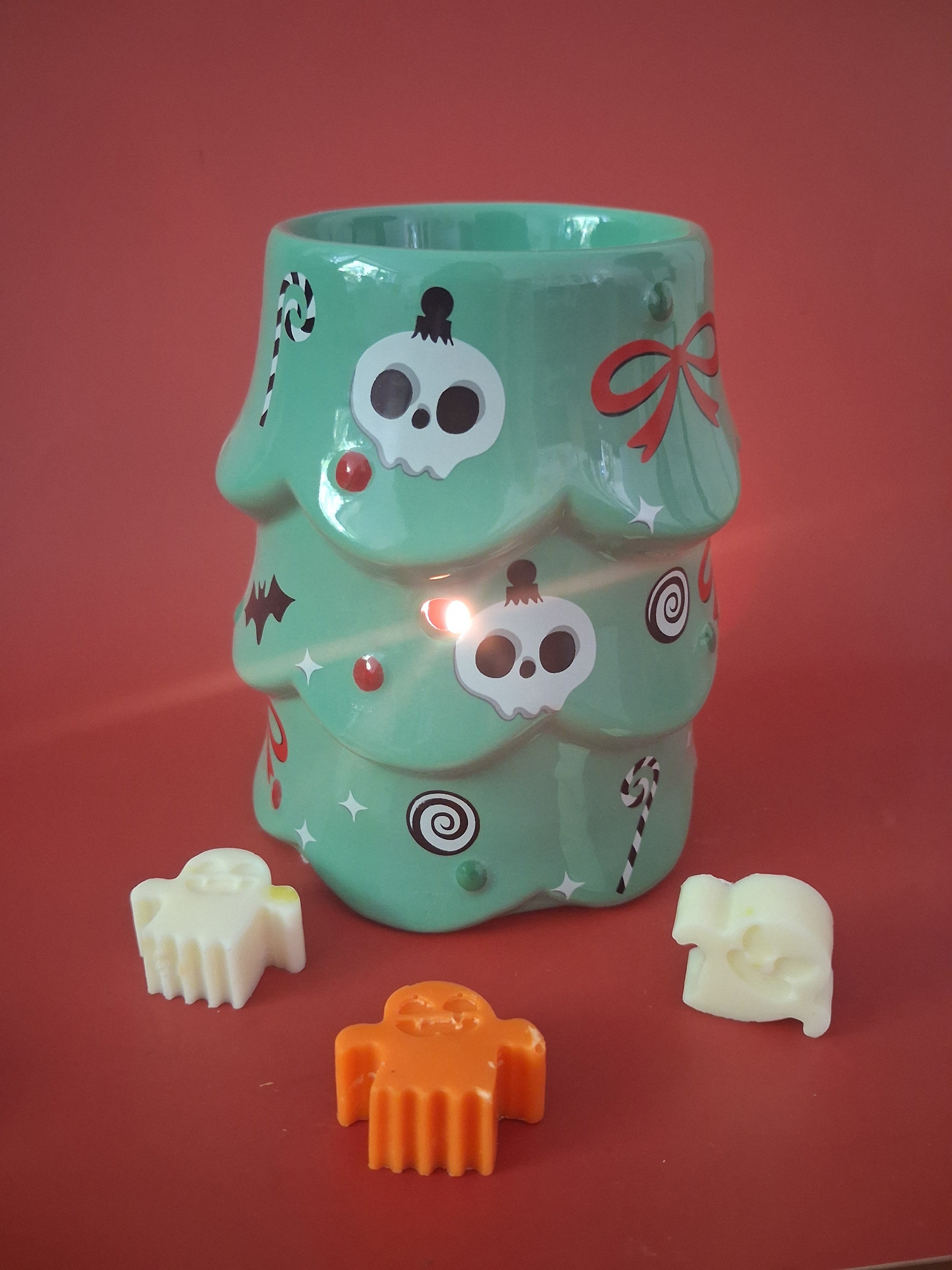 Griezelige kerstboom waxmeltbrander